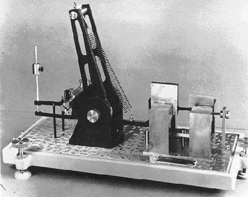 Image of a Sprengnether Vertical Component Seismometer. Photo from Saint Louis University Earthquake Center, https://www.eas.slu.edu/eqc/eqc_history/SprengnetherInstruments/sprengz.jpg